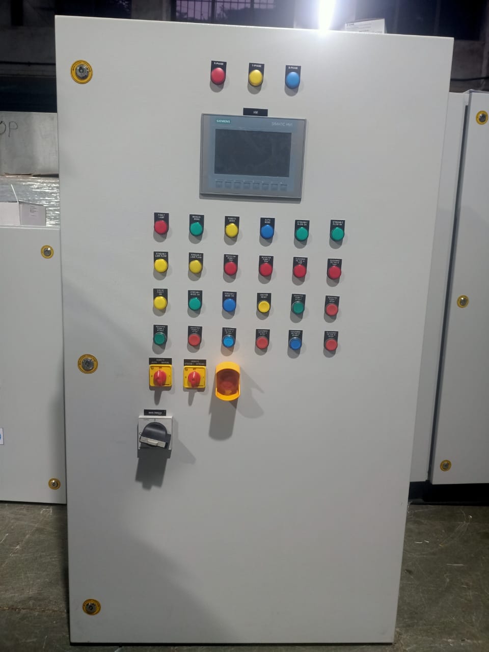 PLC HMI control panel with industrial push buttons selector switches and emergency stop